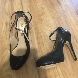 INC- Black stiletto  heels that tie at the ankles.
